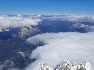 Snow covered mountain top in Austria. View of the Alps from the Zugspitze, the highest mountain in Germany
