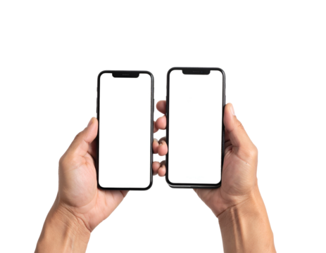 Human hands hold up two adjacent smartphones with blank screens, set against a black background