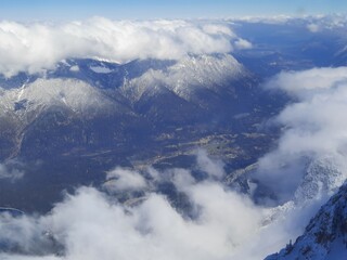 Snow covered mountain top in Austria. View of the Alps from the Zugspitze, the highest mountain in Germany