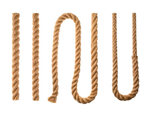 Various brown ropes, straight and curved, isolated on a black background