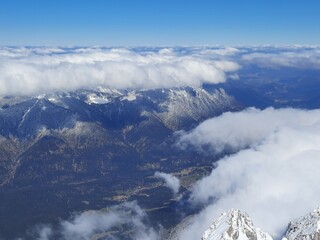 Snow covered mountain top in Austria. View of the Alps from the Zugspitze, the highest mountain in Germany