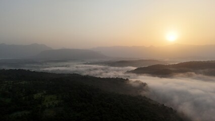 Sunrise over the clouds