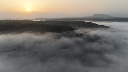 Obraz premium Sunrise over the clouds