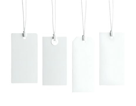 Four plain, white rectangular tags hanging from strings against a stark black background