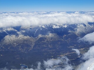 Snow covered mountain top in Austria. View of the Alps from the Zugspitze, the highest mountain in Germany