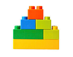 A pyramid structure is built with colorful, plastic interlocking construction bricks