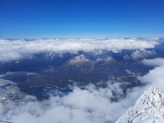 Snow covered mountain top in Austria. View of the Alps from the Zugspitze, the highest mountain in Germany