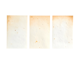 Three aged, vertically-oriented paper sheets with spots, set against a black background