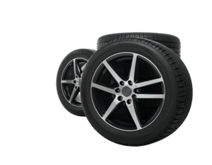 Perspective shot of three new car wheels stacked in a diagonal arrangement against a dark backdrop