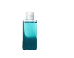 A small, clear plastic bottle filled with blue liquid against a stark black background
