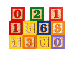 A colorful arrangement of wooden toy blocks displaying different numerical digits