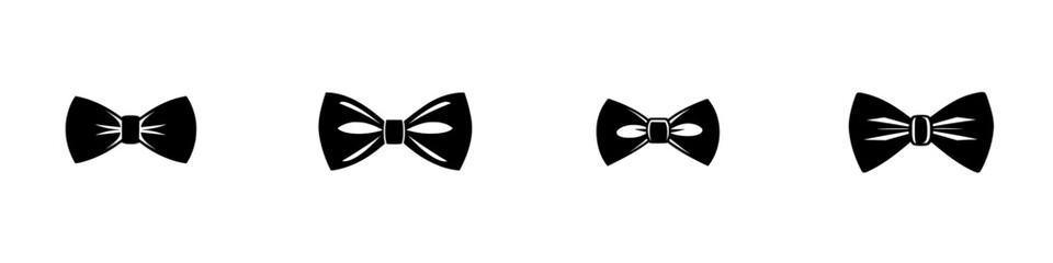 Different styles of bow ties displayed in a simple arrangement against a plain background, showcasing fashion accessories for formal occasions