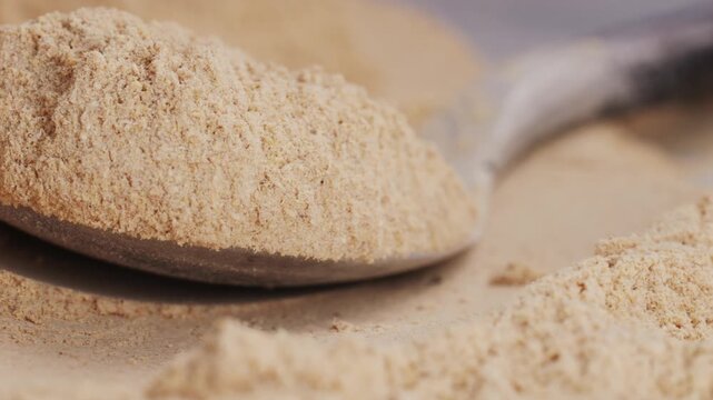 Ashwagandha Indian Ginseng Powder in White Bowl isolated on white background, superfood close up. 