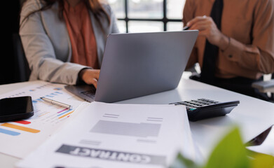 Team of business people advisor meeting to analyze and discuss the situation on the financial report Investment Consultant, Financial , teamwork ,brainstorming ,startup and accounting.
