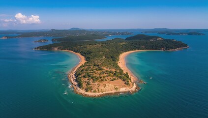 Fototapeta premium Bird's-eye perspective of a coastal peninsula surrounded by water