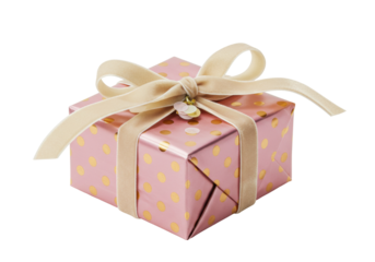 Isolated gift box with a light-tan ribbon and gold polka dots on pink wrapping paper, present