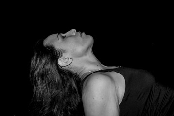 Woman relaxing with closed eyes in profile