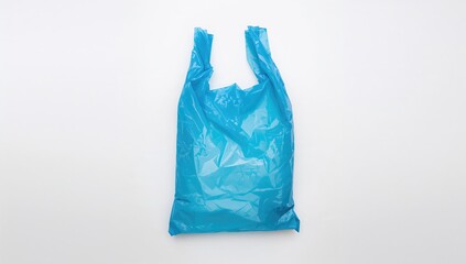 Empty blue plastic bag on a white backdrop
