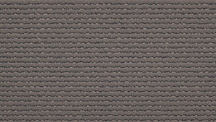 Close-up of a textured asphalt surface showcasing fine granules, overhead perspective of pavement design