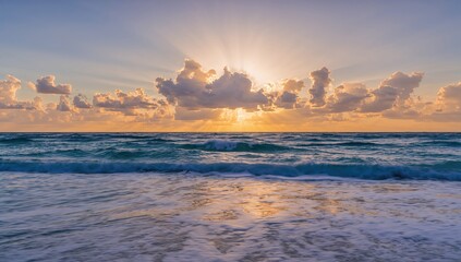 Obraz premium Extended Exposure Ocean Scene Featuring Sun, Clouds, and Glittering Water