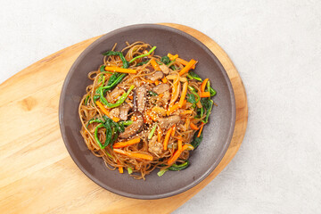 Japchae is a dish made by stir-frying vegetables, mushrooms, meat, and other ingredients and mixing them with boiled glass noodles.

