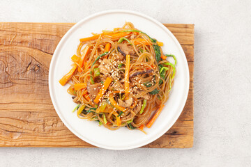 Japchae is a dish made by stir-frying vegetables, mushrooms, meat, and other ingredients and mixing them with boiled glass noodles.

