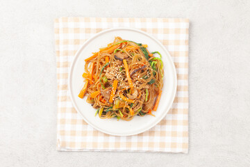 Japchae is a dish made by stir-frying vegetables, mushrooms, meat, and other ingredients and mixing them with boiled glass noodles.

