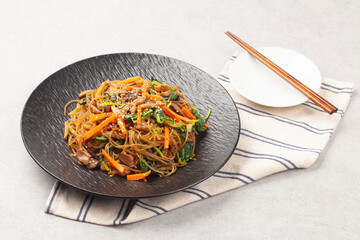 Japchae is a dish made by stir-frying vegetables, mushrooms, meat, and other ingredients and mixing them with boiled glass noodles.

