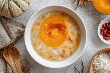 Cook the mature sweet pumpkin until soft, mash it, and mix with glutinous rice flour to prepare a porridge. Occasionally, red beans or Saealsim are included for a spicy twist.
