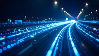 Blue light trails with bokeh effect, creating a sense of speed and movement, against a dark blue background with scattered light points