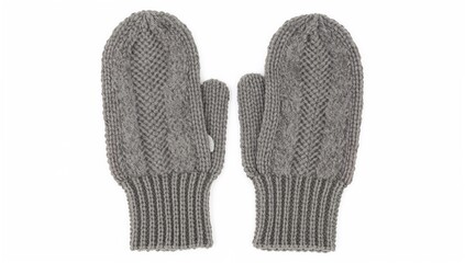 Flat lay of gray wool mittens with a detailed knit pattern, isolated fingerless winter gloves macro closeup with vintage texture