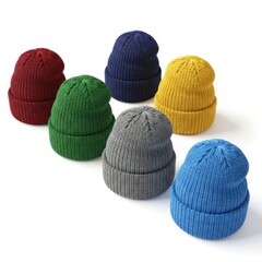 Six colorful knitted beanies isolated on white background