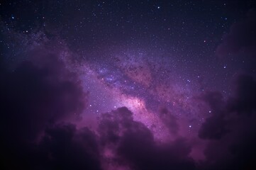 Fototapeta premium Cosmic expanse with swirling violet and blue hues under a star-filled night