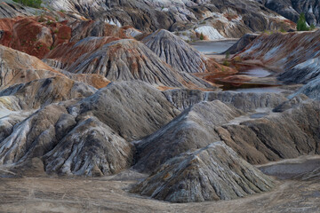 The landscape of an abandoned clay quarry on August day. Ural Mars. Sverdlovsk region. Russia