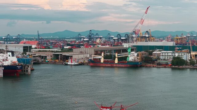 Aerial view shipping port boat with crane transport industry