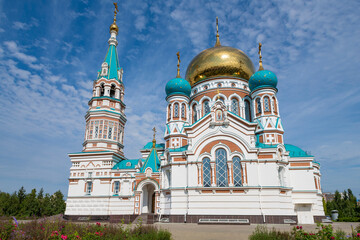 Cathedral of the Assumption of the Blessed Virgin Mary on a sunny August day. Omsk, Russia