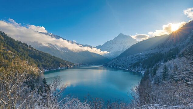 Stunning scenery of a serene lake with a towering snowy mountain under clear skies