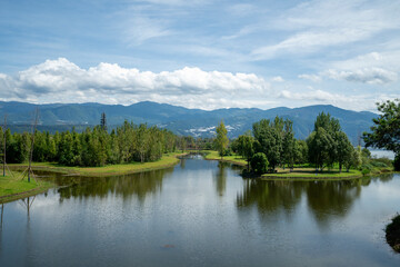 Panoramic Lake and Mountain Range Natural Scenery