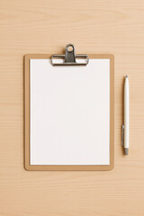 Minimal clipboard and pen on light wooden desk — perfect for document templates, mockups, or medical office use