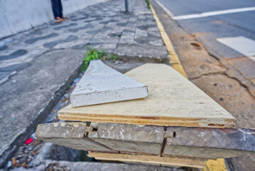 Broken and open manhole with a lot of dirt inside