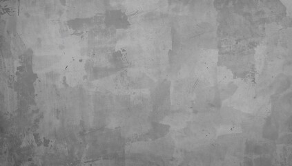 Obraz premium Decorative gray plaster surface featuring vignette effect. Abstract textured background ideal for design space.