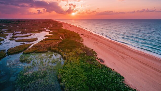 Bird's-eye perspective of a scenic creek and its beautiful tidal waterways in a remote northern coastal area of Australia.