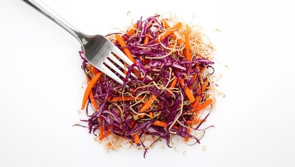 Vegan red cabbage salad with carrots and bean sprouts on a fork - healthy lifestyle idea