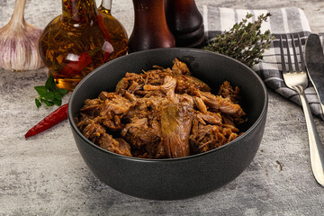 Shredded slow cooked pork meat