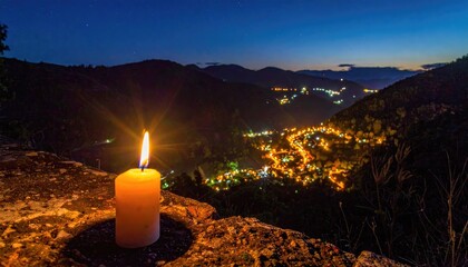 Night Lights Over Mountain Valley with Burning Candle