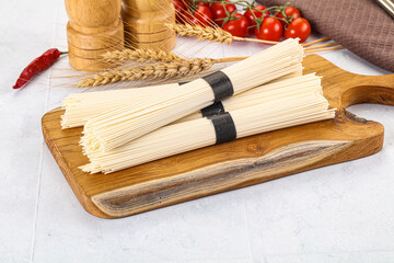 Raw dry white wheat noodles