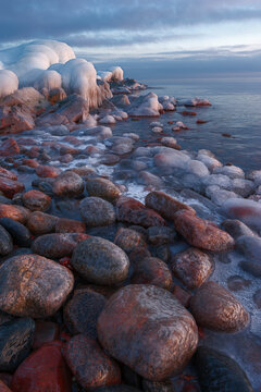 Rocky shore near sea during winter