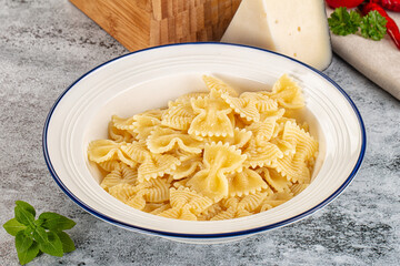 Italian pasta Farfalle with oil