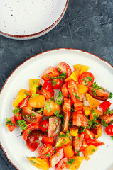Fresh salad with tomatoes.