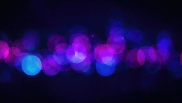 Out-of-focus illuminated nightscape with vibrant blue, pink, and purple hues